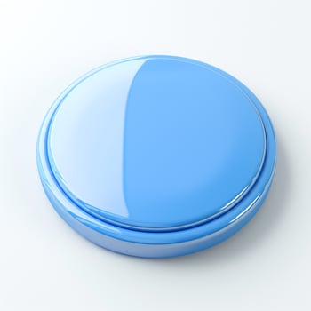 A glossy blue circular container resting on a light surface, showcasing its smooth, modern design. photo