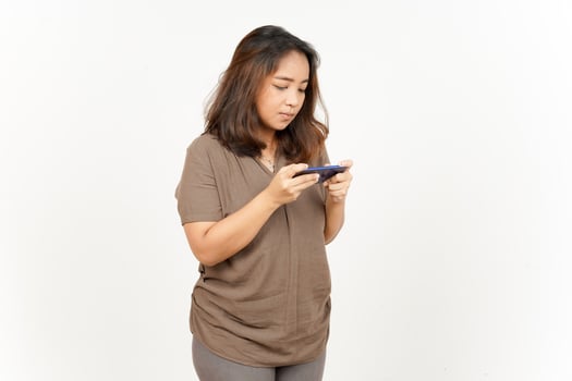Asian woman texting on her phone photo