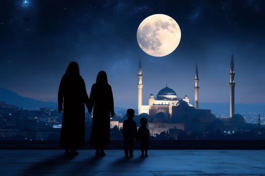 Muslim family looking at illuminated mosque under full moon photo