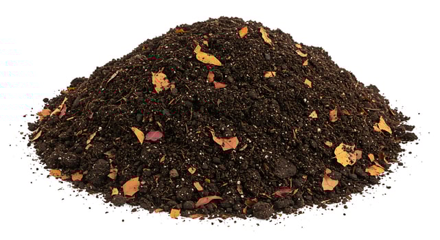 Rich Dark Brown Soil Pile with Autumn Leaves Garden Compost up top fall heap farm dirt view earth photo