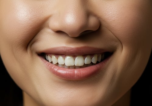 A captivating close-up of a woman's radiant smile, showcasing healthy teeth. photo