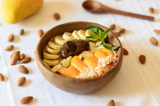 Bowl with delicious healthy snacks photo