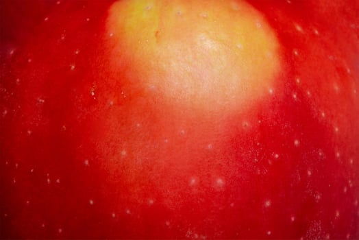 Red apple as a background. Macro photo of apple texture.
