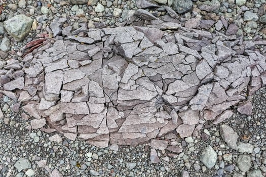 Cracked basalt rock formation showing natural tessellation in iceland photo