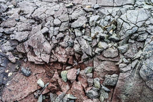 Basalt rock formation showing cracks and erosion in iceland photo