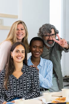 A group of people posing for a picture photo