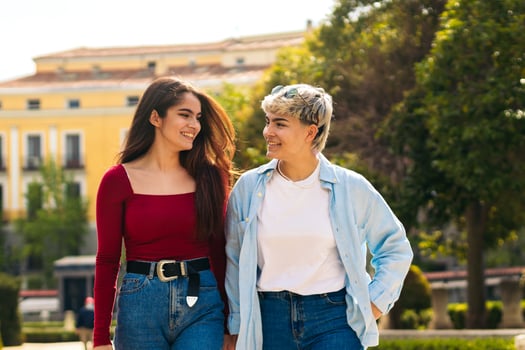 Two women walking in a park photo