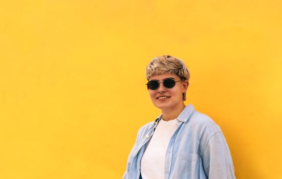 stylish young girl with short hair smiling. portrait photo
