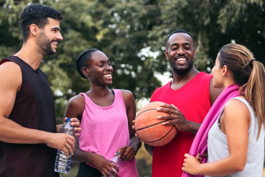 Team Spirit Multiracial Friends Bonding After a Fun Basketball Game photo
