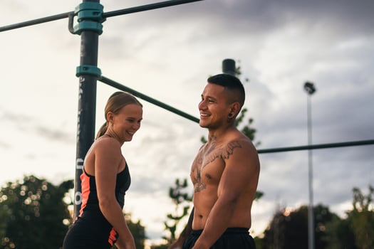 interracial couple training outdoors photo