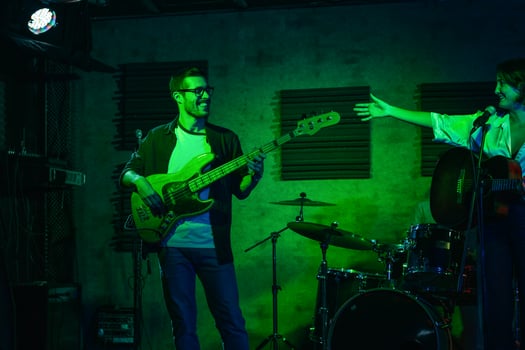 Young Musician Playing The Bass In A Live Concert photo