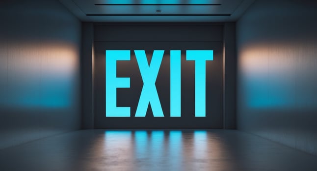 Exit sign in an empty hallway photo