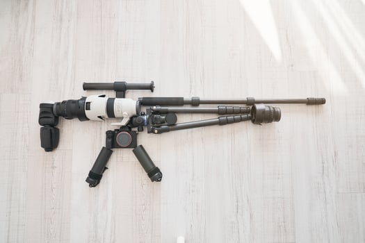 Sniper made with photography equipment for shooting photo