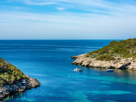 Cala Portinax bay with beautiful azure blue sea water photo