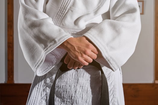 Unrecognizable person in kimono prepared for training photo