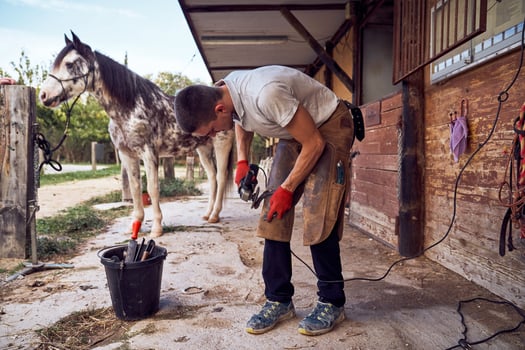 A man is holding a tool photo