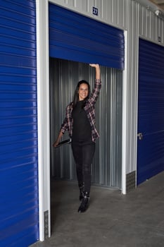 Content woman opening door of photo