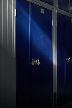 Modern blue lockers in rows in container building photo
