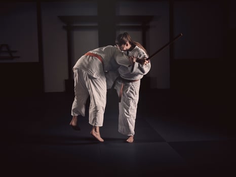 Man and woman fighting during Krav Maga lesson photo