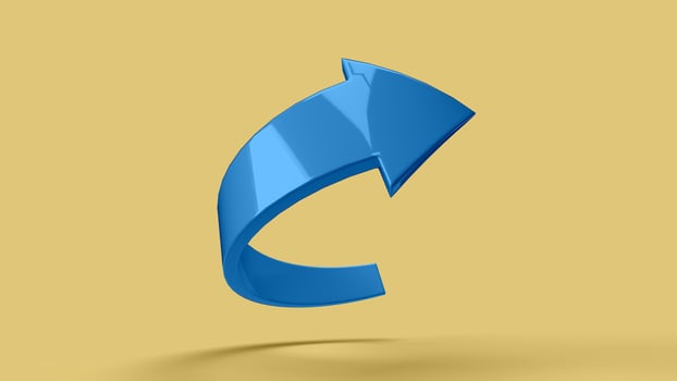 Blue 3D curved arrow symbol in the yellow scene, bottom view photo