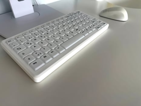 Dental White Keyboard and Mouse on Desk photo
