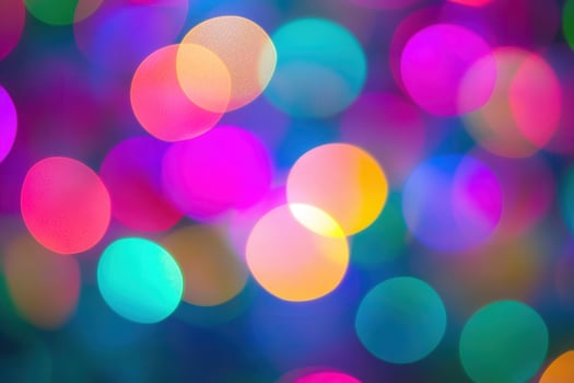 Colorful lights are shown in a blurry photo