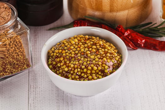 A bowl of mustard seeds photo