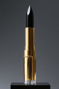 Elegant black lipstick in gold packaging on display photo