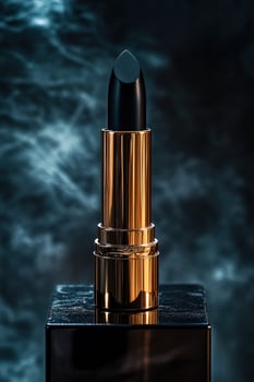 Black lipstick displayed on elegant surface with smoky background photo