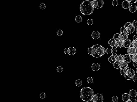 Multiple soap bubbles floating on a dark backdrop. photo