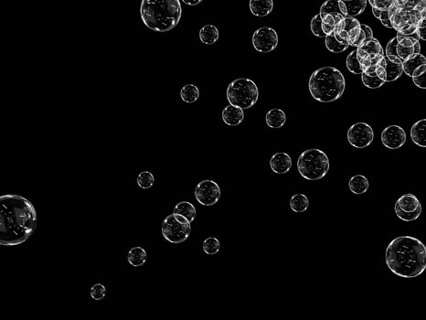 Clear bubbles in motion on a dark black backdrop. photo