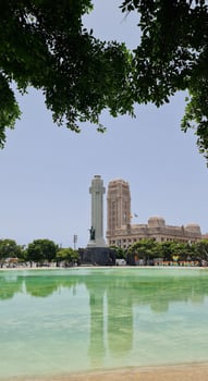 SANTA CRUZ DE TENERIFE, TENERIFE, SPAIN - July 3, 2024. View to Spain square with surrounding buildings and fountain photo
