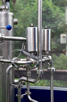 Stainless steel storage and processing tanks. photo