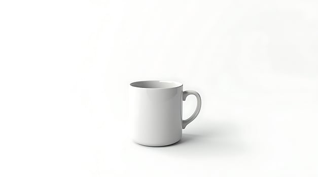 A white mug is sitting on a table photo
