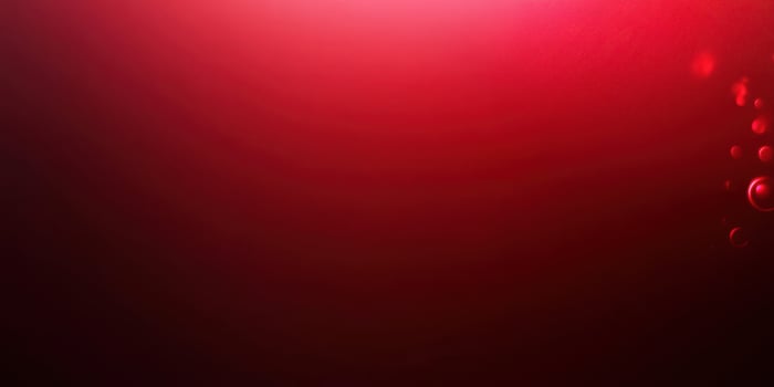Vibrant red abstract background with soft bokeh lights creating a warm, inviting atmosphere photo