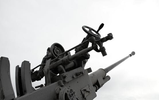 Old Large-Caliber Ship Gun Isolated On White photo