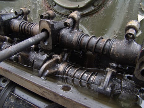 Detailed Close Up of Old Rusty Engine Springs and Parts photo