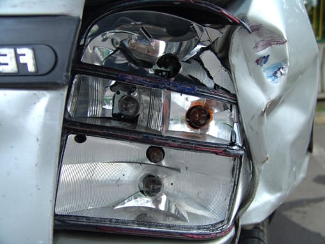Damaged Car Rear Headlight Close Up photo