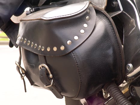 Vintage Leather Motorcycle Saddlebag with Metal Studs photo