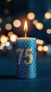 Bright blue candle with a decorative number celebrating a special milestone in a festive atmosphere at night photo