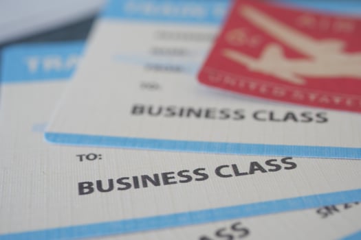 Travel documents for business class flight preparation photo