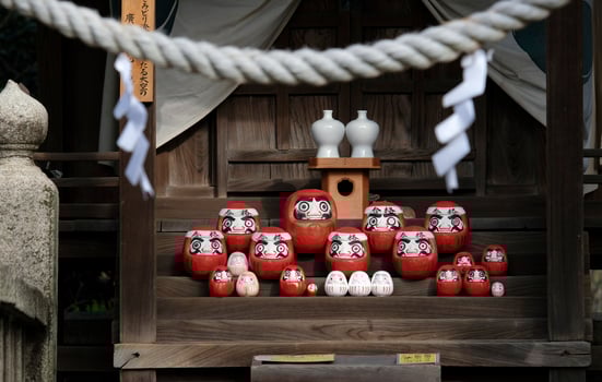 Daruma dolls in a temple in Kurashiki, Japan photo