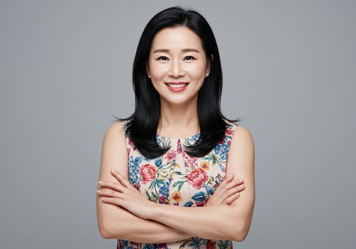 An asian woman with her arms crossed photo
