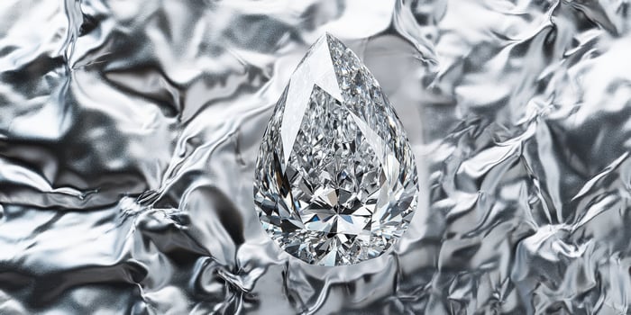 Sparkling diamond with reflective background symbolizing luxury and elegance photo