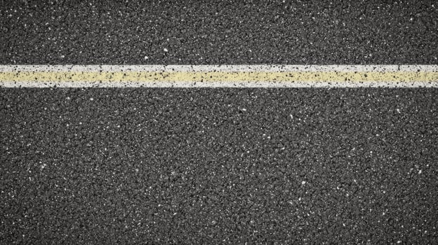 Single white line on asphalt road surface for transportation concept photo