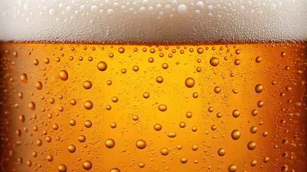Close up of a beer glass with bubbles photo