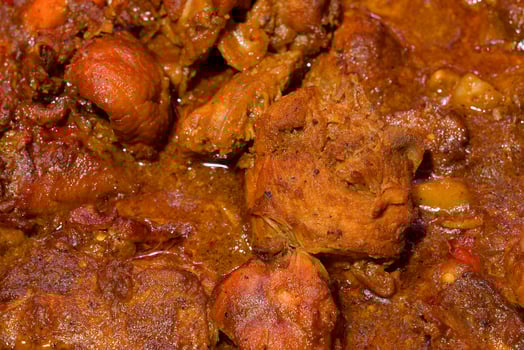 chicken and pork stew with fried bananas photo