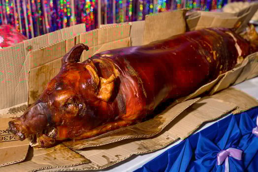 whole pork lechon served during a fiesta photo