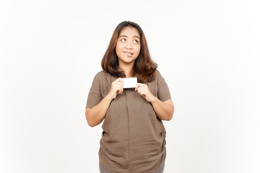 A woman holding a blank piece of paper photo