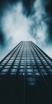 Dramatic Skyscraper POV Against Stormy Sky Capturing Modern Urban Architecture photo